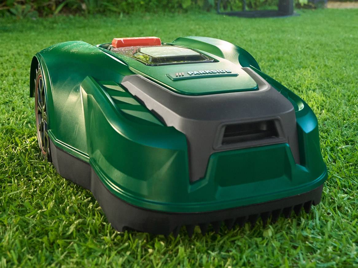 Parkside robotic lawn mower on grass.