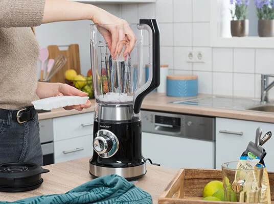 Blender and ice cubes in the kitchen.