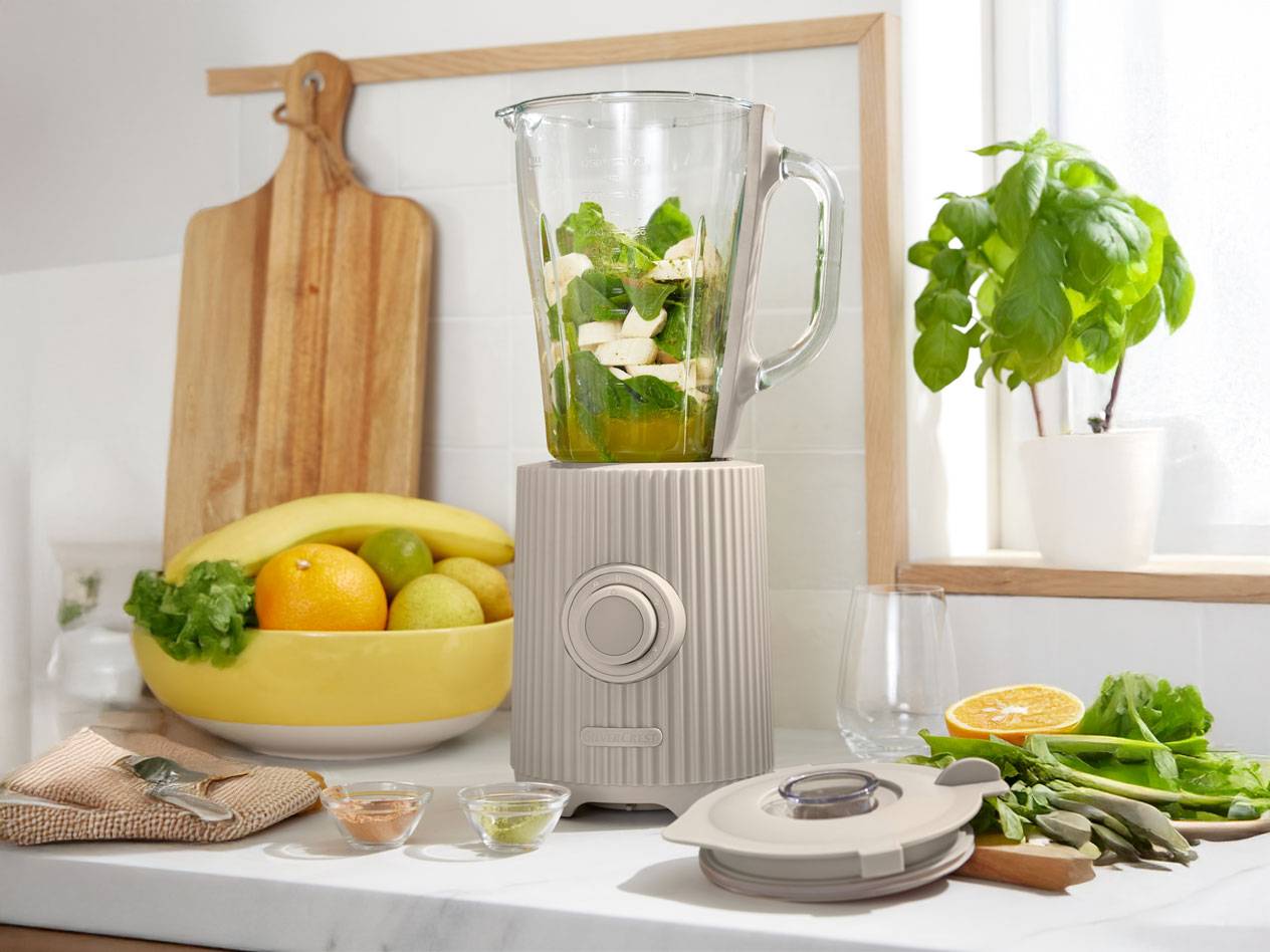 Blender and fruits for a smoothie.